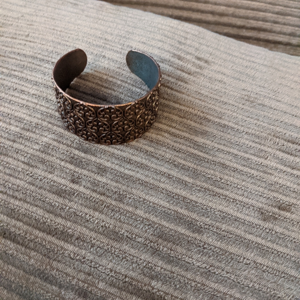 Antiqued copper colored cuff bracelet